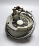 A ship's compass with attached gimbal