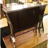 A late Victorian mahogany Sutherland table with shaped top on carved underframe, width 63cm depth