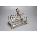 A Victorian silver six-division toast rack, George Angell & Co, London, 1853, length 16.3cm, 10oz.