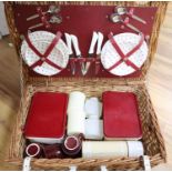 A wicker cased picnic set
