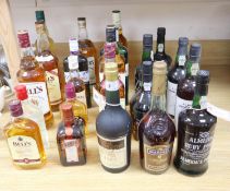 A mixed collection of wines and spirits, including vintage ports and whiskies