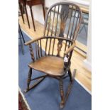 A Victorian ash and elm Windsor rocking chair