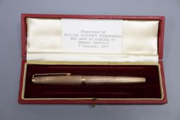 A cased 9ct Parker pen