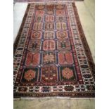 A Caucasian garden design rug, 310 x 160cm