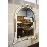 A simulated ivory wall mirror, width 80cm, height 105cm