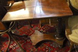 A Victorian mahogany adjustable reading table, the top fitted two adjustable sections, width 82cm,