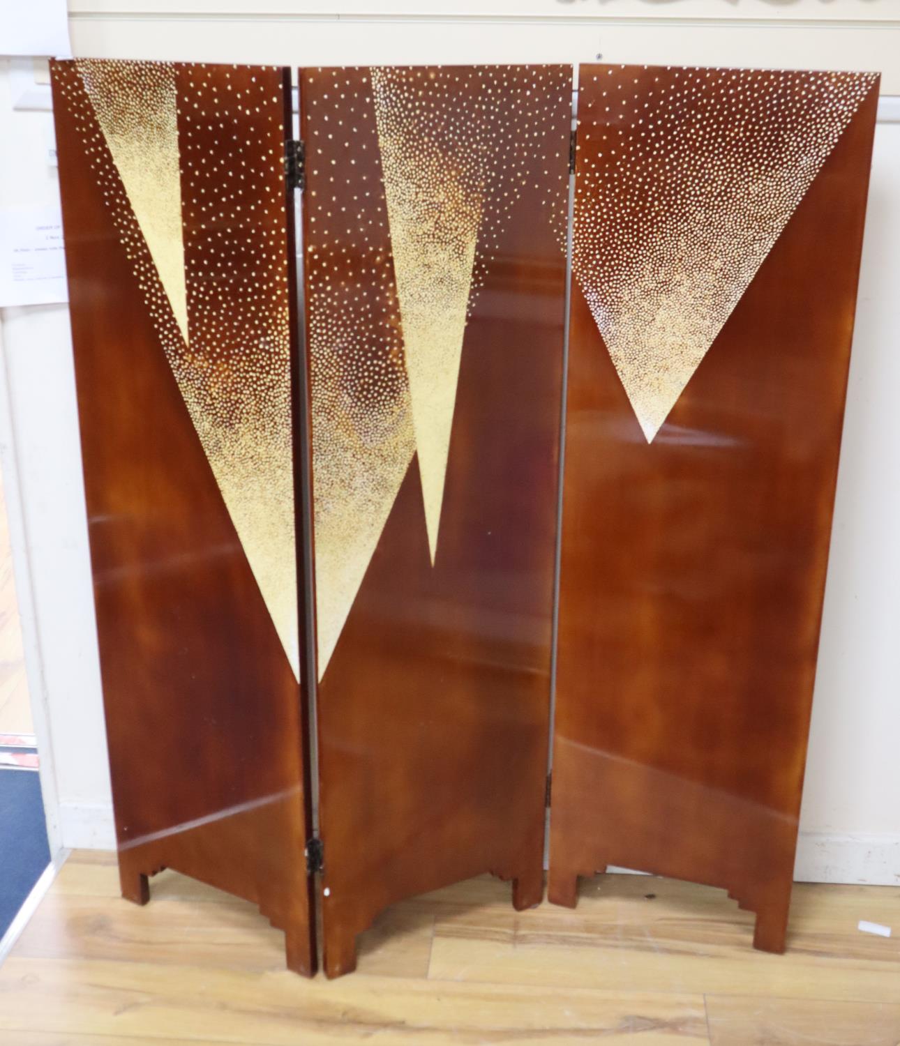 A French lacquered wood and eggshell 3-fold screen each panel; Height 137cm. width 40cm. Ex