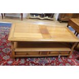 A cherry two tier coffee table, width 120cm, depth 60cm, height 46cm