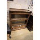 A Globe Wernicke style oak two section bookcase, width 87cm, depth 32cm, height 94cm