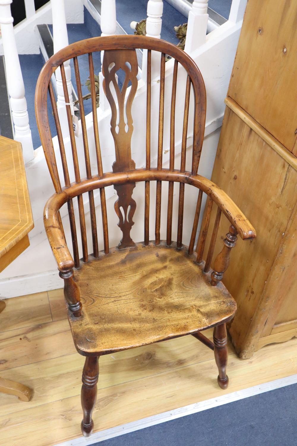 A 19th century yew and elm Windsor armchair