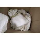 A quantity of assorted table linen, a lace cover, damask tablecloths, lace trimming, etc.