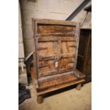 A low occasional table and an Eastern hardwood corner cupboard