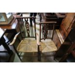 A set of six early 20th century beech ladder back dining chairs (two with arms)