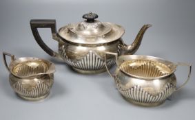 An Edwardian silver three piece tea set by Mappin & Webb, Sheffield, 1900, 1908/9, gross 32oz.