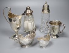 A Georgian silver helmet-shaped cream jug and five other items, comprising a small half-fluted cream