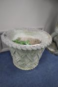 A pair of reconstituted stone basketweave planters, diameter 53cm, height 39cm