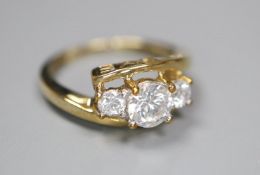 A 9ct gold and simulated diamond three stone ring, size J, gross 1.9 grams.