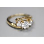 A 9ct gold and simulated diamond three stone ring, size J, gross 1.9 grams.