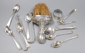 A pair of silver sugar tongs, various silver teaspoons, a sifter spoon, napkin ring and a silver-