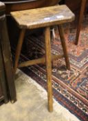 A 19th century primitive ash and elm coffin stool, height 67cm