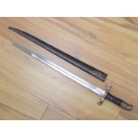 A Victorian Portuguese bayonet, by Steyr, dated 1886, blade 47cm, within sheath