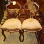 A set of six Victorian mahogany dining chairs, on cabriole legs