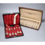 A cased set of silver teaspoons, a set of continental white metal cake forks and sundry mainly