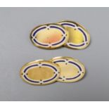 A pair of George V 18ct gold and two colour enamel oval cufflinks, gross 9.4 grams.