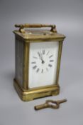 An hour repeating brass carriage clock,14cm