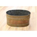 An early 19th century copper and brass bound log bin, length 43cm