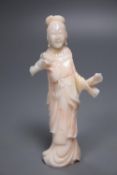 A Chinese carved coral figure of a lady, 10cm