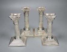 Two pairs of silver corinthian column dwarf candlesticks, Sheffield, 1920 and Sheffield, 1962,