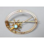 A 9ct and turquoise set oval openwork spider brooch, 25mm, gross 1.7 grams.