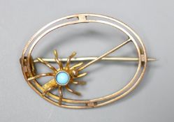 A 9ct and turquoise set oval openwork spider brooch, 25mm, gross 1.7 grams.