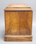 A Victorian walnut sewing/writing cabinet, width 13cm