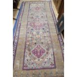 A Persian wool rug, 430 x 190cm