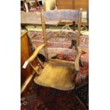 A Victorian elm and beech Windsor elbow chair