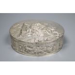 A late 19th/early 20th century German embossed 800 white metal oval box with hinged cover, 13.4cm,