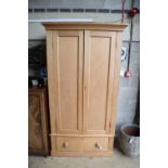 A late Victorian pine wardrobe, width 115cm, depth 51cm, height 215cm