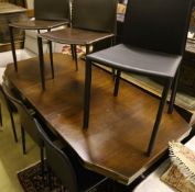 A military style mahogany and brass bound twin pillar dining table, width 182cm extended (one