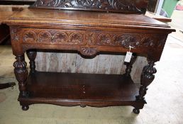 An early 20th century carved oak two tier serving table, width 107cm, depth 44cm, height 96cm