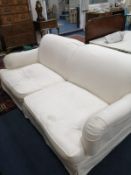 A modern Howard style three seater settee, height 86cm