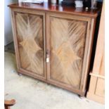 An Edwardian banded and inlaid mahogany two door cupboard, width 122cm, depth 59cm, height 130cm