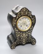 A 19th century French inlaid mantel clock with enamelled numerals, countwheel striking on a bell,