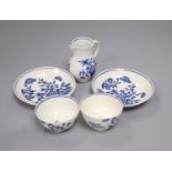 A group of Worcester 'Three Flowers' tea wares, c.1775, comprising two tea bowls and saucers and a