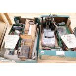 A collection of vintage tinplate/clockwork vehicles and stationery engines, including a Schuco