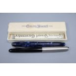 A boxed Conway Stewart blue marbled fountain pen and a Parker 51