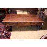 An Eastern rectangular topped hardwood coffee table, fitted two drawers, width 148cm, depth 74cm,