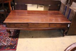 An Eastern rectangular topped hardwood coffee table, fitted two drawers, width 148cm, depth 74cm,