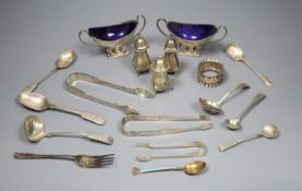 A pair of Edwardian silver boat shaped salts, three silver pepperettes and a small group of silver